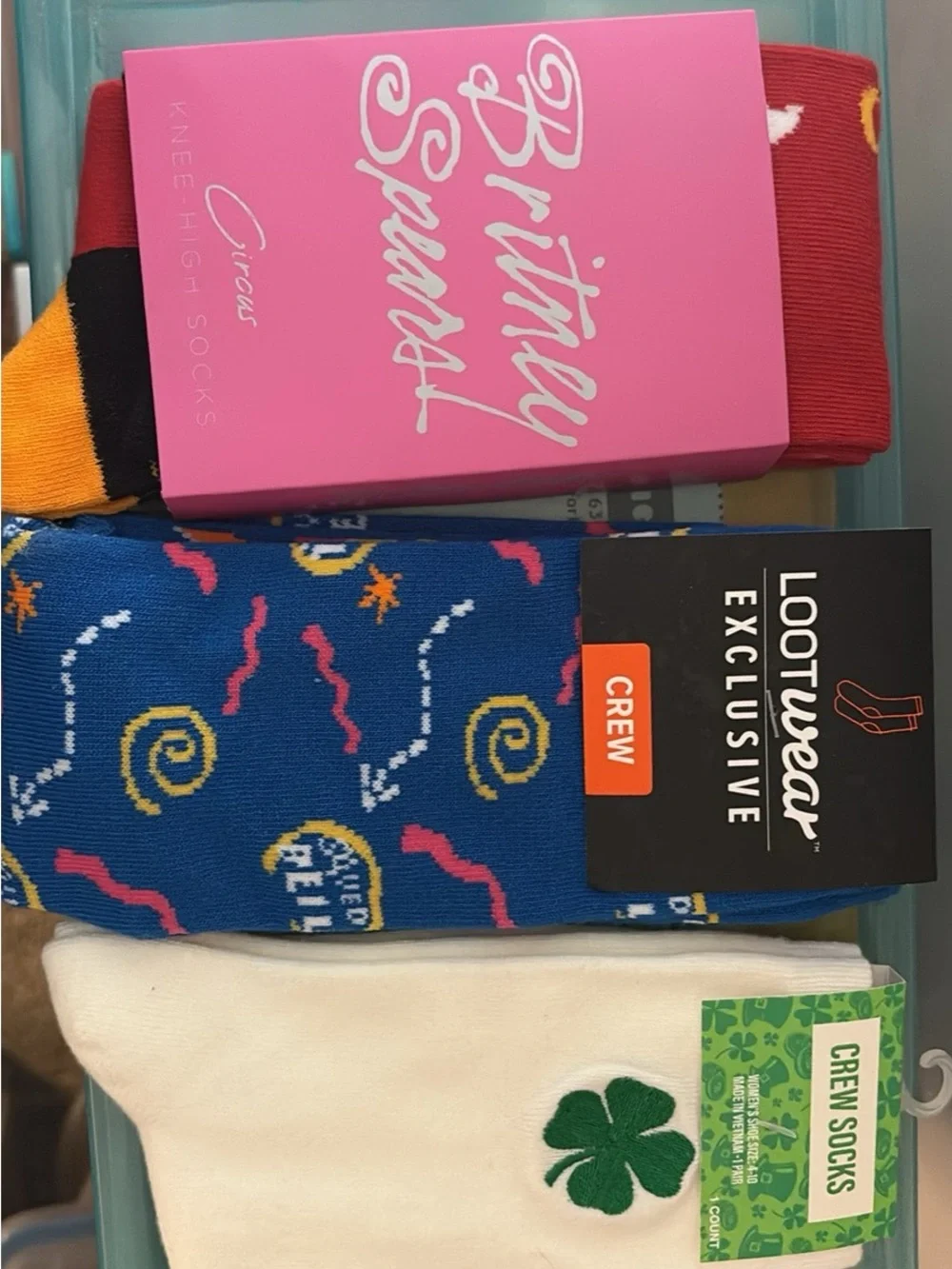 Women’s sock bundle. Brittney Spears, saved by the bell, and a shamrock pair